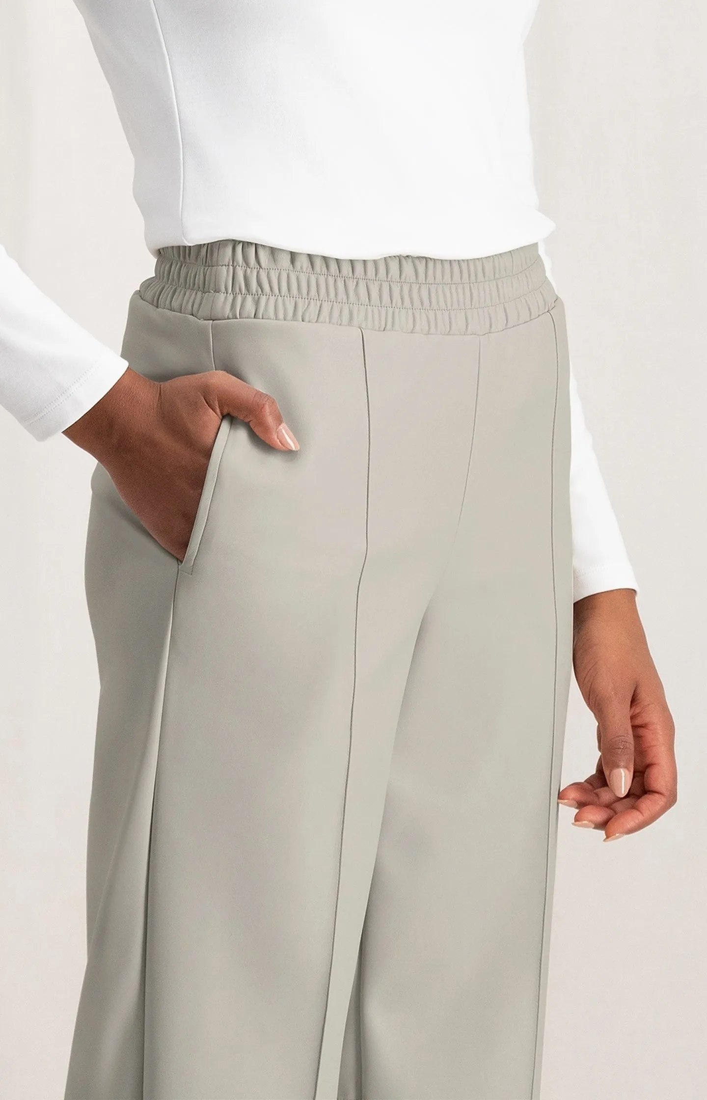 Faux leather wide leg trousers with elastic waist and pocket