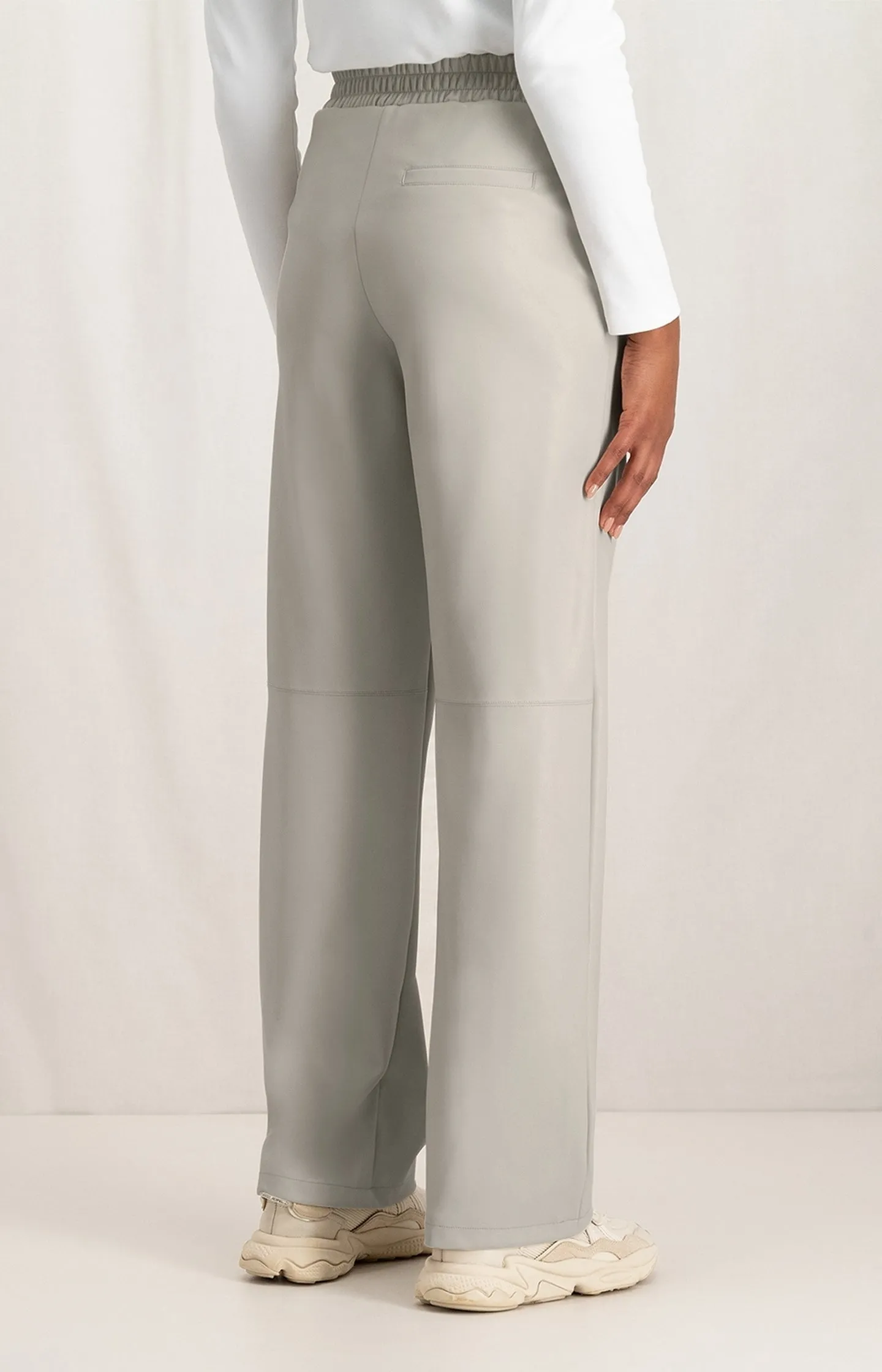 Faux leather wide leg trousers with elastic waist and pocket